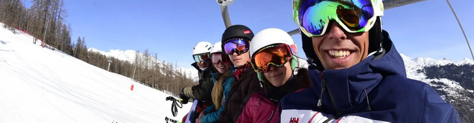 Cours de ski alpin débutant en cours collectifs