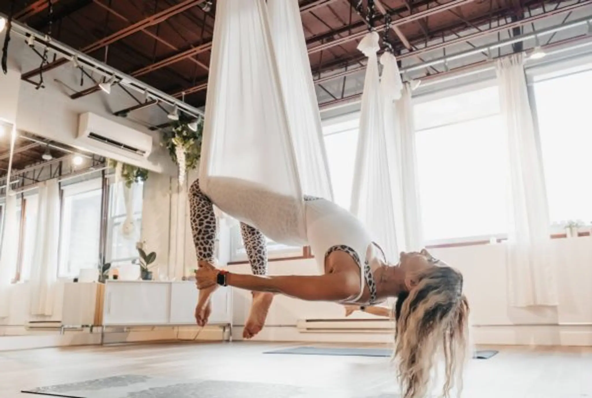 AT OM YOGA + PILATES