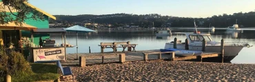 Mitchies Jetty Merimbula’s Happy Place Stand Up Paddle & Kayak Hire